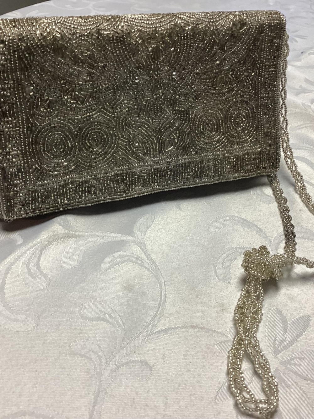 Beaded evening bag with chair lovely
